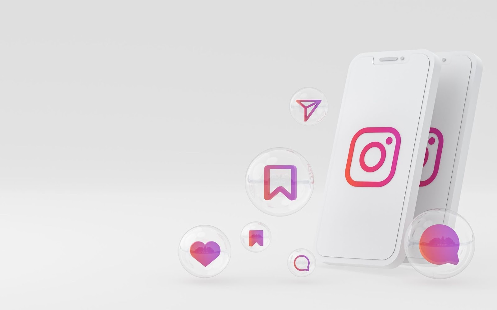 Aplicativo para Ganhar Seguidores no Instagram: A Melhor Escolha com Seguidores em Alta 4
Duas telas de smartphones brancas, exibindo o ícone do Instagram, com outros ícones de recursos do Instagram — como curtir, salvar, compartilhar e comentar — flutuando ao redor em bolhas translúcidas. A imagem representa um aplicativo para ganhar seguidores.